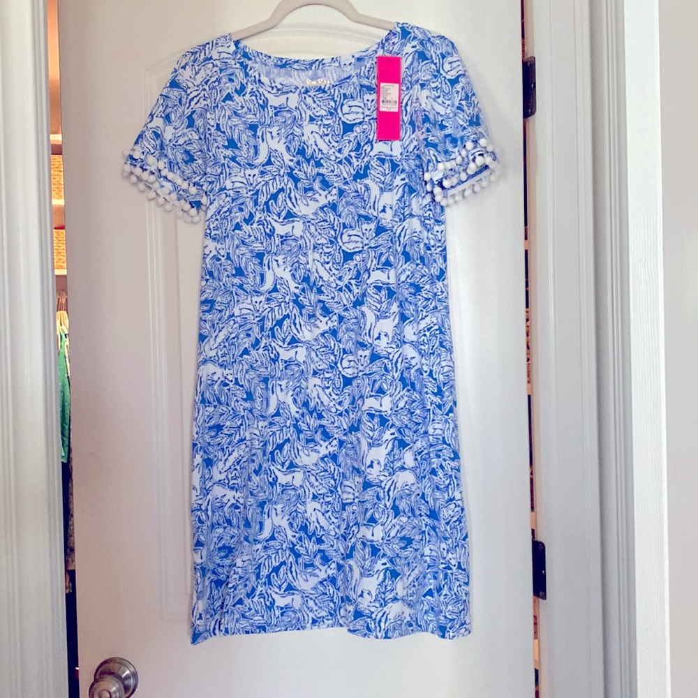 New with tags Lilly lissie dress with Pom poms on the sleeves. Never worn.